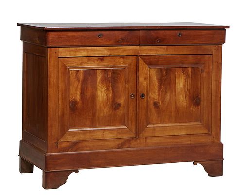 French Provincial Louis XV Style Carved Walnut Sideboard, 19th c., the stepped rounded edge and corner top over two large fielded panel cupboard doors