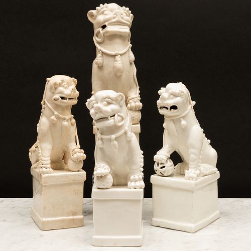 Group of Four Blanc de Chine Porcelain Buddhistic Lion Joss Stick Holders