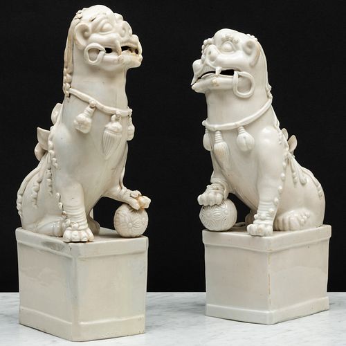 Two Blanc de Chine Porcelain Buddhist Lions Joss Stick Holders