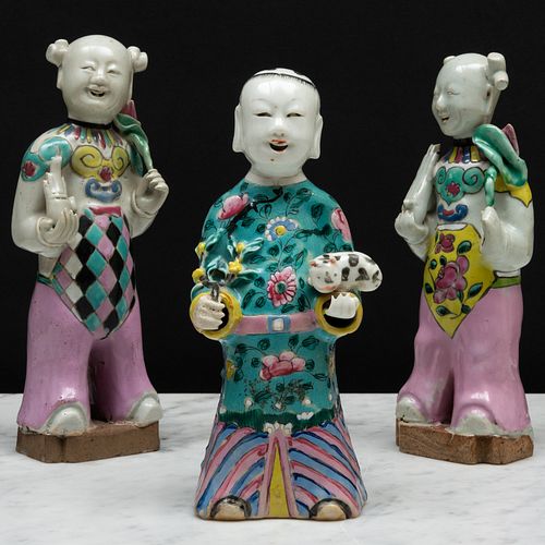 Group of Three Chinese Famille Rose Porcelain Figures of Boys