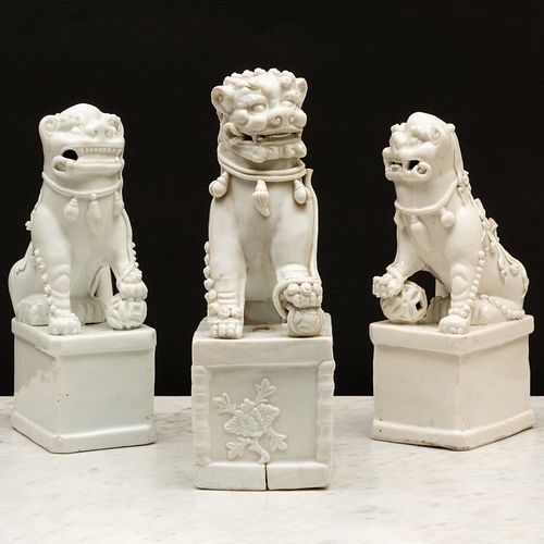 Group of Three Blanc de Chine Porcelain Buddhistic Lions
