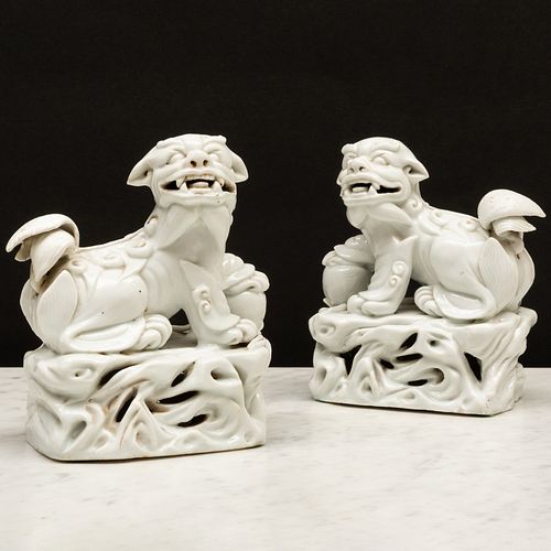 Pair of Blanc de Chine Porcelain Buddhistic Lions