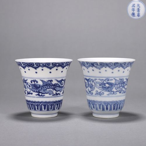 A pair of blue and white dragon porcelain cups