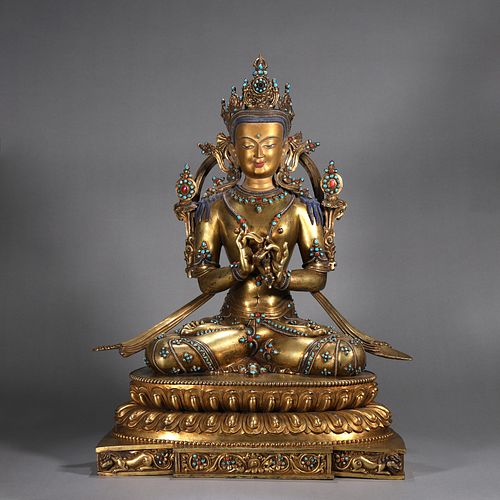 A gilding copper Mahavairocana buddha statue