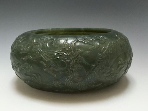 A CARVED SPINASH-GREEN JADE WATERPOT. 18TH/19TH CT