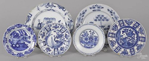 Two Delft blue and white chargers, 18th c., together with four plates, largest - 13 3/4'' dia.