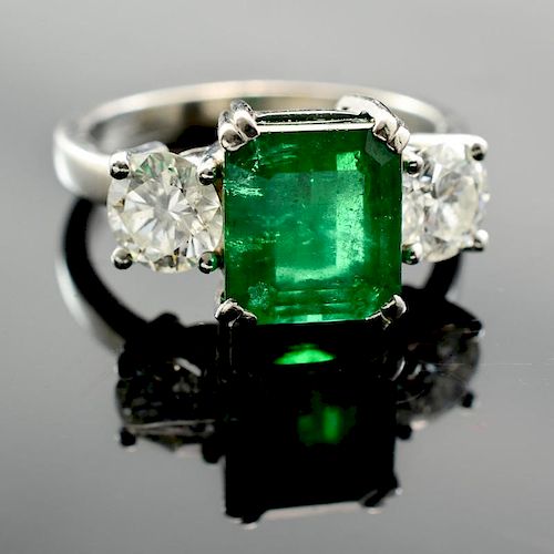 A platinum, Emerald and Diamond Ring
