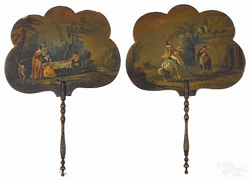 Pair of Victorian painted papier-mâché hand fans, late 19th c., one titled Going to the Camp
