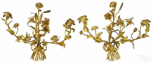 Pair of French gilt bronze three-arm sconces, early 20th c., 12'' h., 17'' w.