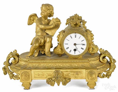 French gilt metal mantel clock, 19th c., with putti, 11'' h.