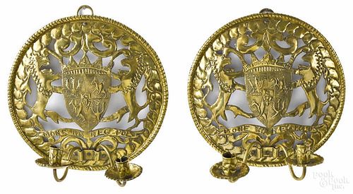 Pair of Continental embossed brass sconces, 18th c., depicting the Polish arms of Sigismund III