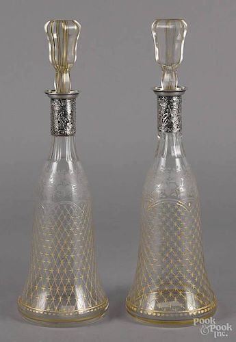 Pair of etched and gilt decorated decanters, late 19th c., with German silver mounts, 15 1/4'' h.