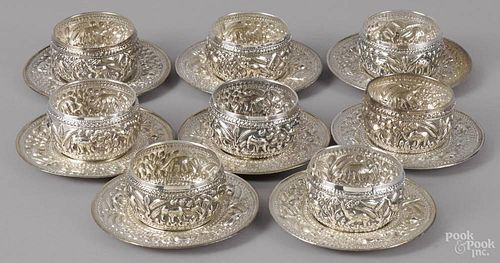 Set of eight Indian 800 silver finger bowls and undertrays, ca. 1900, with repoussé decoration