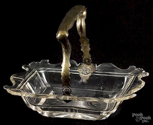 Cut glass basket, late 19th c., with an applied silver handle, bearing Dutch hallmarks, 3 1/2'' h.