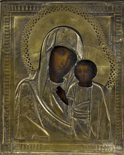 Russian icon of the Mother and Child, late 19th c., with a silvered brass oklad, 10 1/2'' x 8 1/2''.