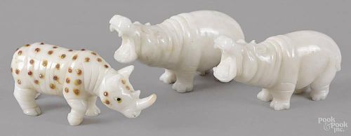 Three carved hardstone animals, to include two hippos and a rhinoceros, 3 3/4'' l.