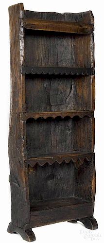 Jacobean style carved oak bookcase, 68'' h., 26'' w.