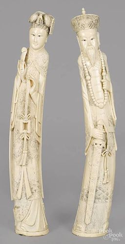 Pair of Chinese carved ivory figures, late 19th c., of an emperor and empress
