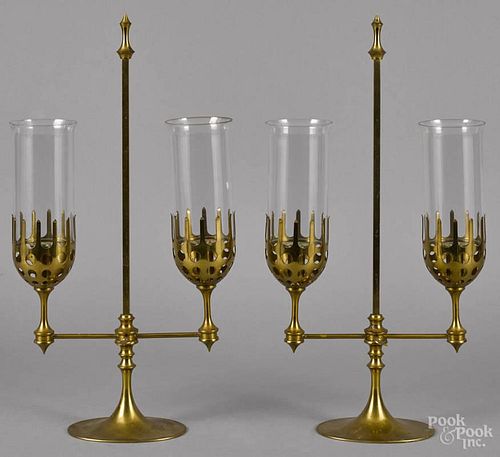 Pair of Danish modern brass candelabra with glass hurricane shades, stamped B Metal on base