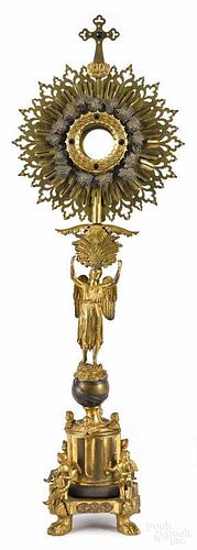 Brass altarpiece, late 19th c., the sunburst top with an oval jeweled frame, 36'' h.