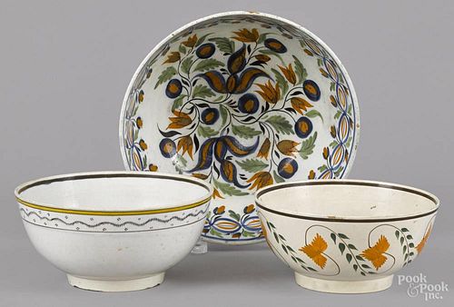 Three English pearlware bowls, early 19th c., with polychrome floral decoration, largest - 4 1/4''