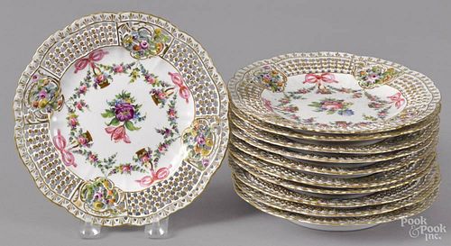 Eleven Dresden reticulated porcelain plates, 7 1/8'' dia.