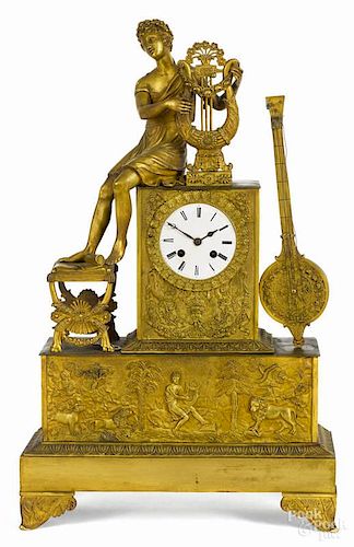 French gilt bronze mantel clock, late 19th c., with a classical figure playing a lyre, 23'' h.