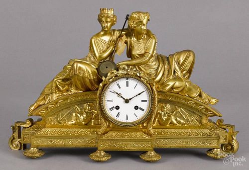 French gilt bronze figural mantel clock, late 19th c., with a Japy Frères movement, 11'' h., 18'' w.