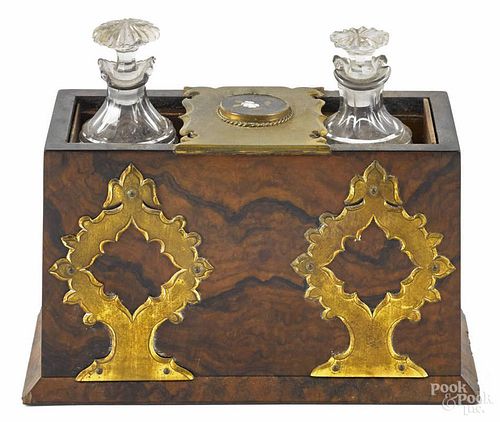 Burl veneer tantalus, mid 19th c., with two cut glass cruets and inset micromosaic roundels