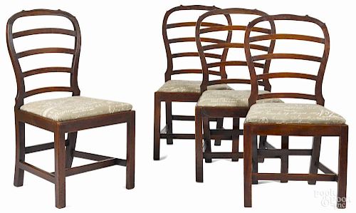 Set of four George III mahogany ribbonback dining chairs, ca. 1780.
