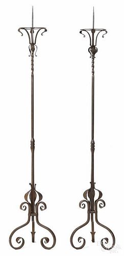 Pair of Continental wrought iron torchieres, 19th c., 74 1/2'' h.