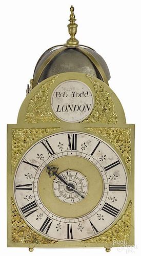 English brass lantern clock, early 18th c., with name boss, inscribed Rob Todd London