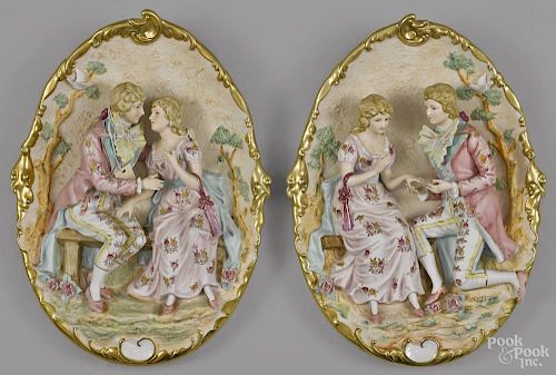 Pair of bisque wall plaques by Pucci, titled Betrothal, 13 3/4'' x 10''.