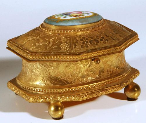 AN ORMOLU JEWELRY CASKET WITH SEVRES TYPE PORCELAIN