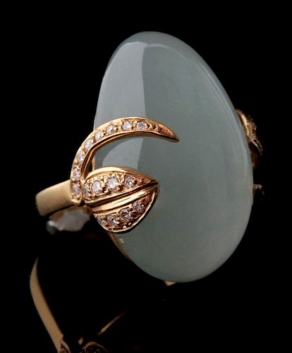 AN 18K GOLD MOONSTONE AND DIAMOND RING