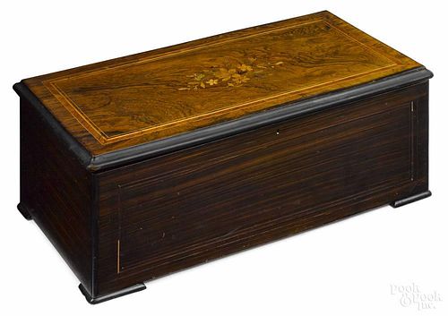 Swiss cylinder music box, late 19th c., with a marquetry inlaid rosewood lid and faux grained case