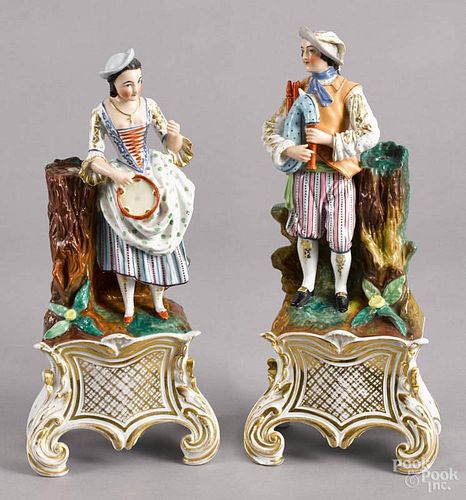 Pair of Continental porcelain figures of a man and woman, ca. 1900, probably German
