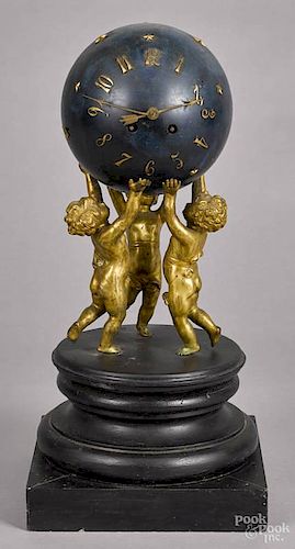 Bronze desk clock, ca. 1900, of three putti holding a blue globe with applied stars, 18 1/2'' h.