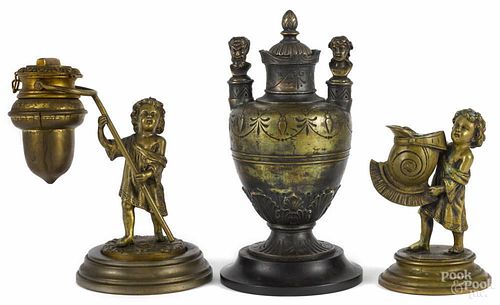 French bronze figural fluid lamp, late 19th c., together with a matching match holder