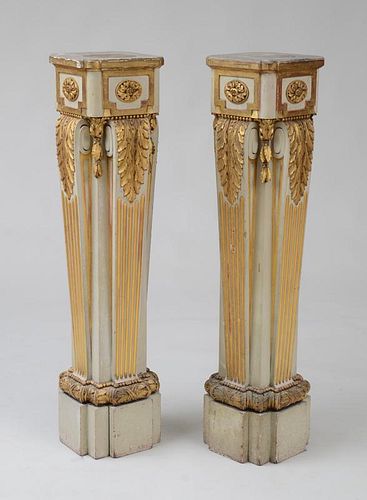 PAIR OF CONTINENTAL NEOCLASSICAL STYLE PAINTED AND PARCEL-GILT PEDESTALS