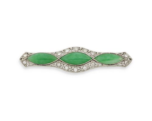 An Art Deco jade and diamond bar brooch