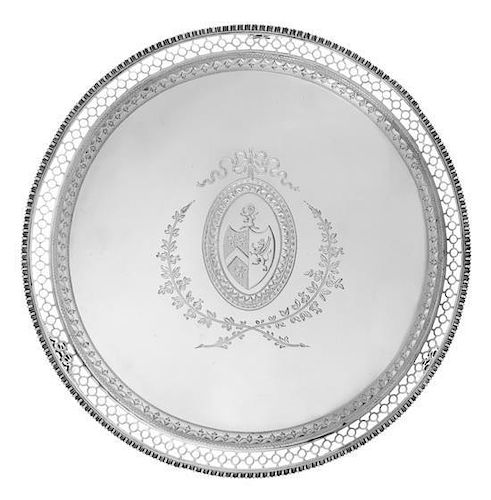 A George III Silver Salver, Richard Rugg I, London, 1773, having a gadrooned rim surrounding a pierced and foliate decorated bor