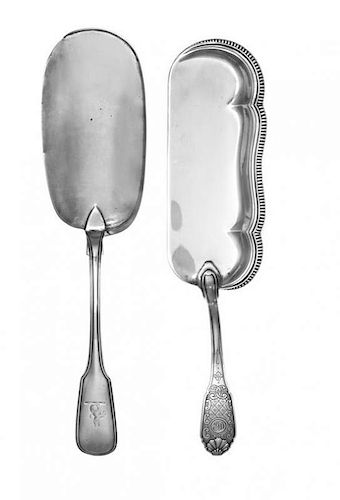 A Victorian Silver Crumber, Samuel Hayne, London, 1864, having a fiddle form handle and an engraved crest, together with a Frenc