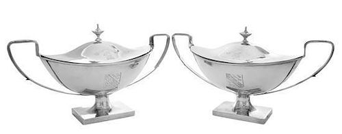 A Pair of American Silver Covered Sauce Tureens, , each of twin handled urn form surmounted by a conforming finial, the lid bear
