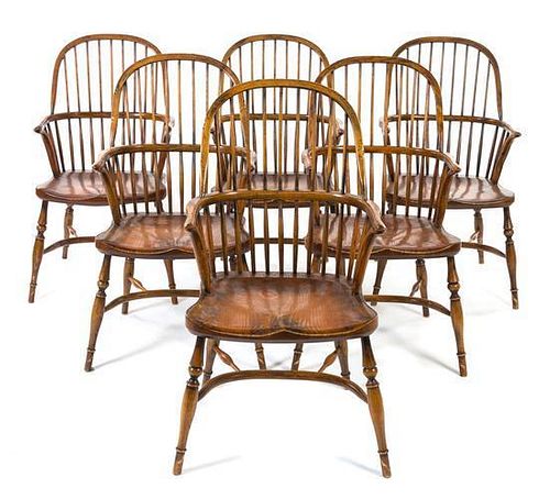 A Group of Six Oak Windsor Armchairs Height 40 1/8 inches.