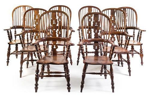 A Set of Eight Yew Wood Windsor Armchairs Height 46 inches.