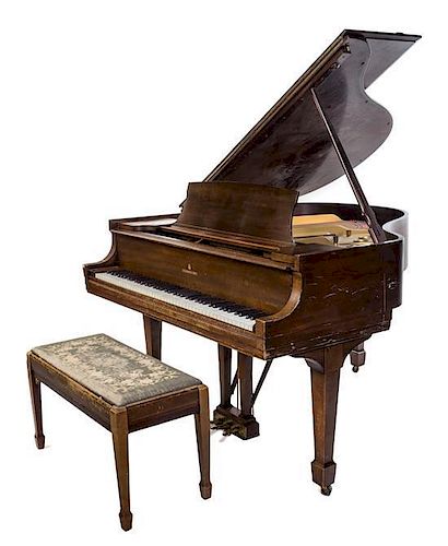 * A Steinway and Sons Baby Grand Piano Length 64 inches.