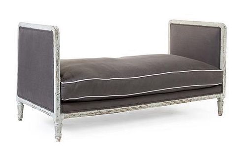 A Louis XVI Style Painted Daybed Height 30 1/4 x width 59 1/2 x depth 28 1/2 inches.