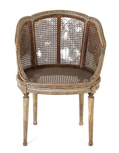 A Louis XVI Caned Bergere Height 32 inches.