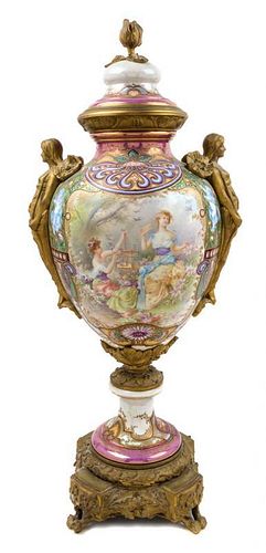 * A Sevres Gilt Bronze Mounted Porcelain Urn Height 31 1/2 inches.